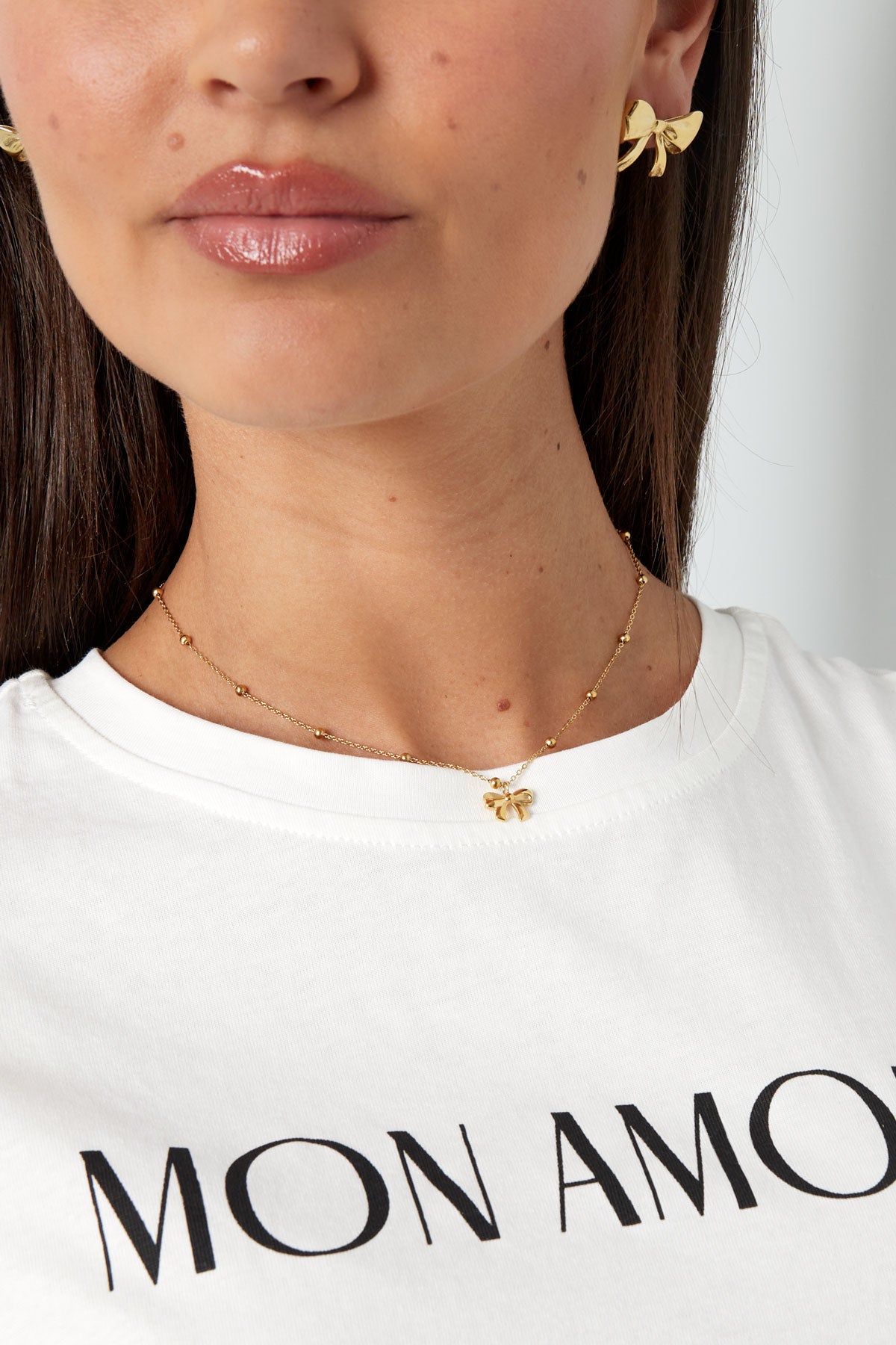 necklace with balls and bow