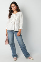 Longsleeve peplum top with bows