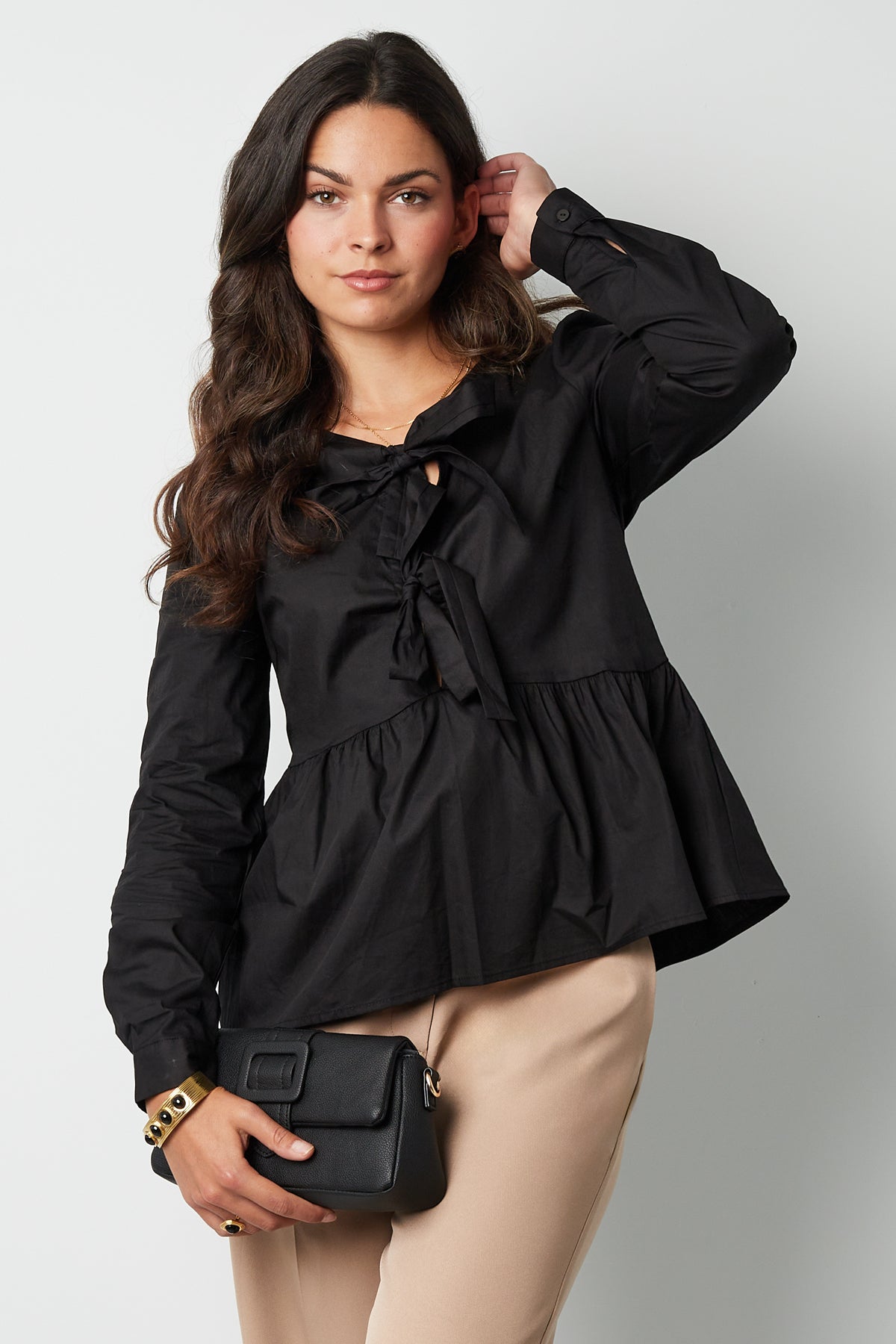 Longsleeve peplum top with bows