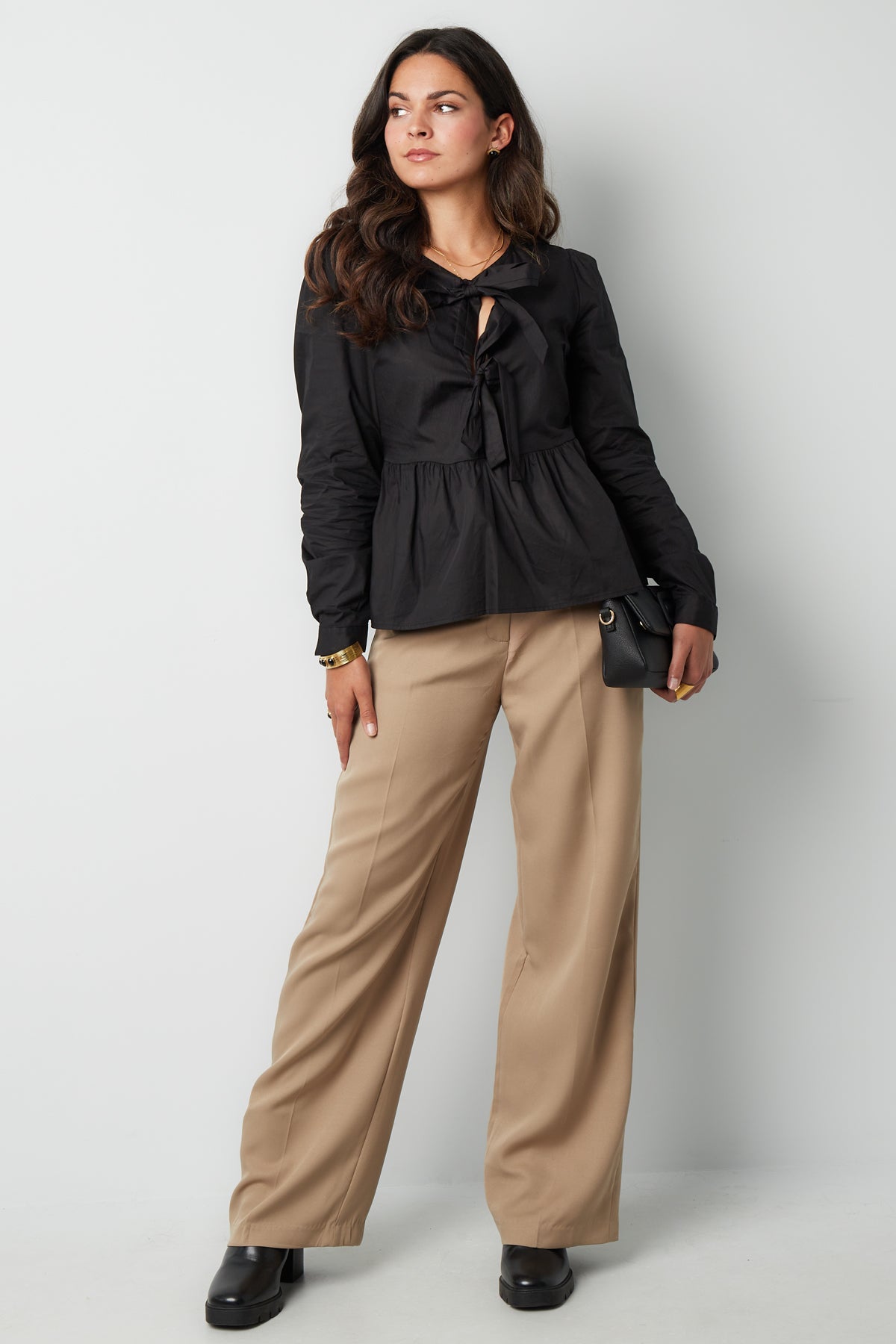 Longsleeve peplum top with bows