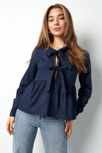 Longsleeve peplum top with bows