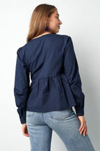 Longsleeve peplum top with bows