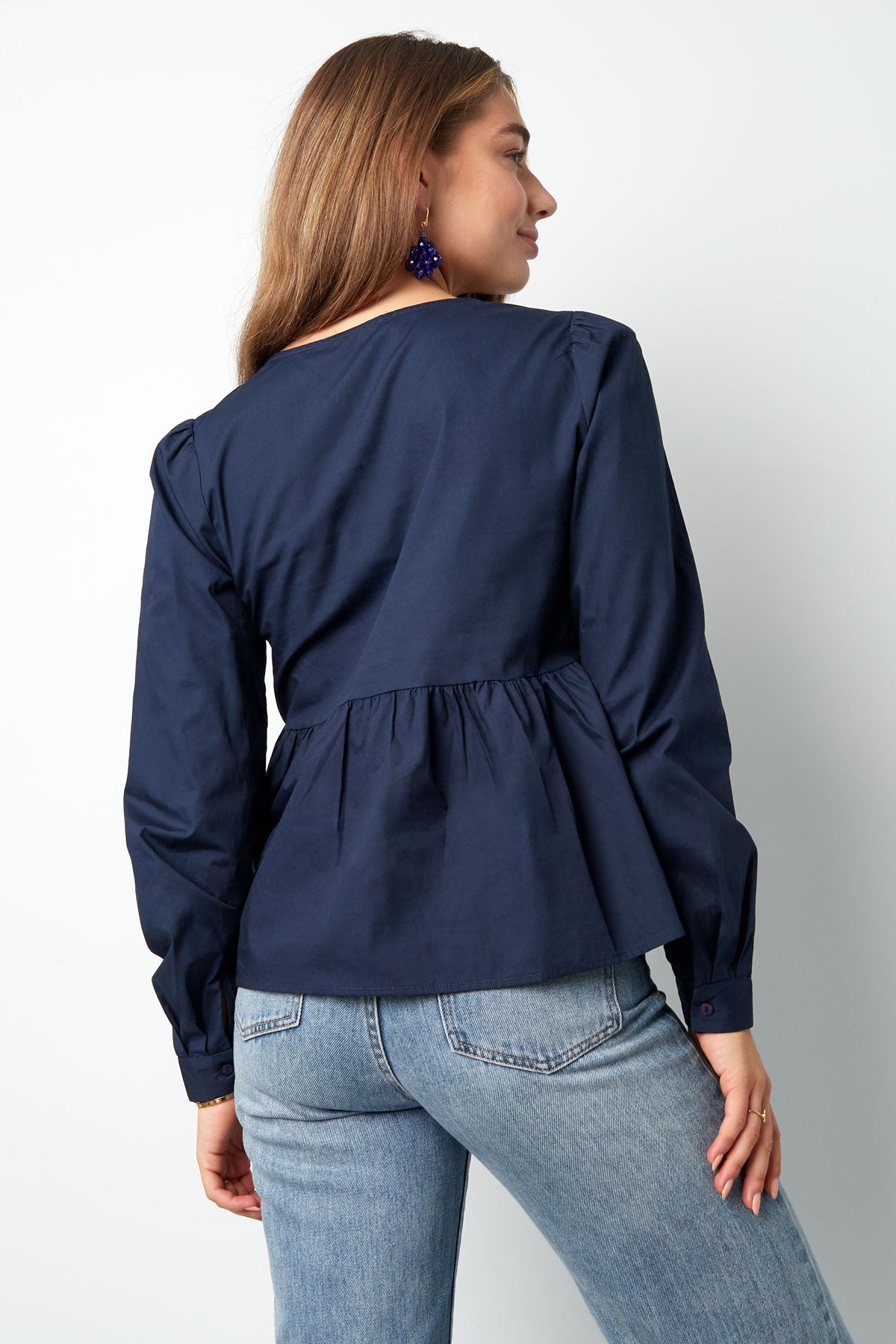 Longsleeve peplum top with bows