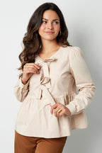 Longsleeve peplum top with bows
