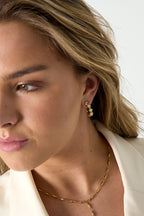 Earrings with alternating stones