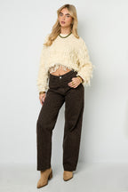 Knitted sweater with fringes