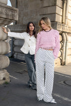 Knitted sweater with fringes