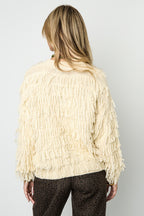 Knitted sweater with fringes