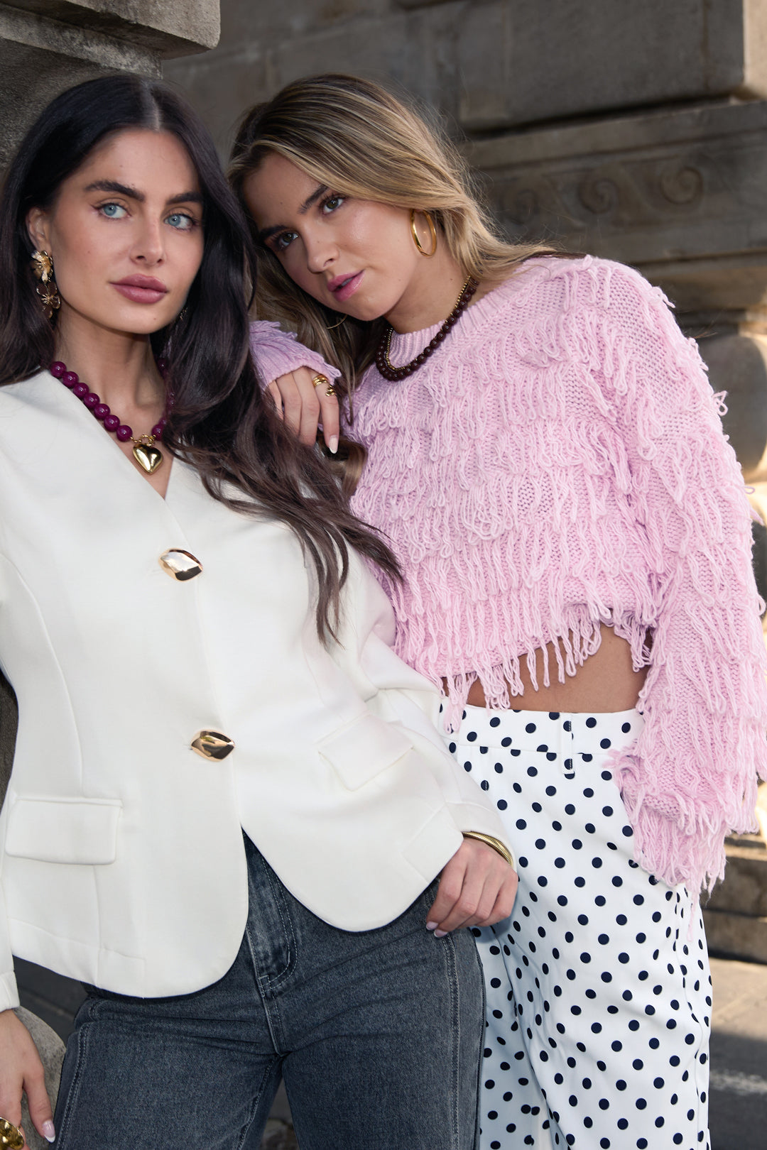 Knitted sweater with fringes