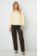 Knitted sweater with fringes