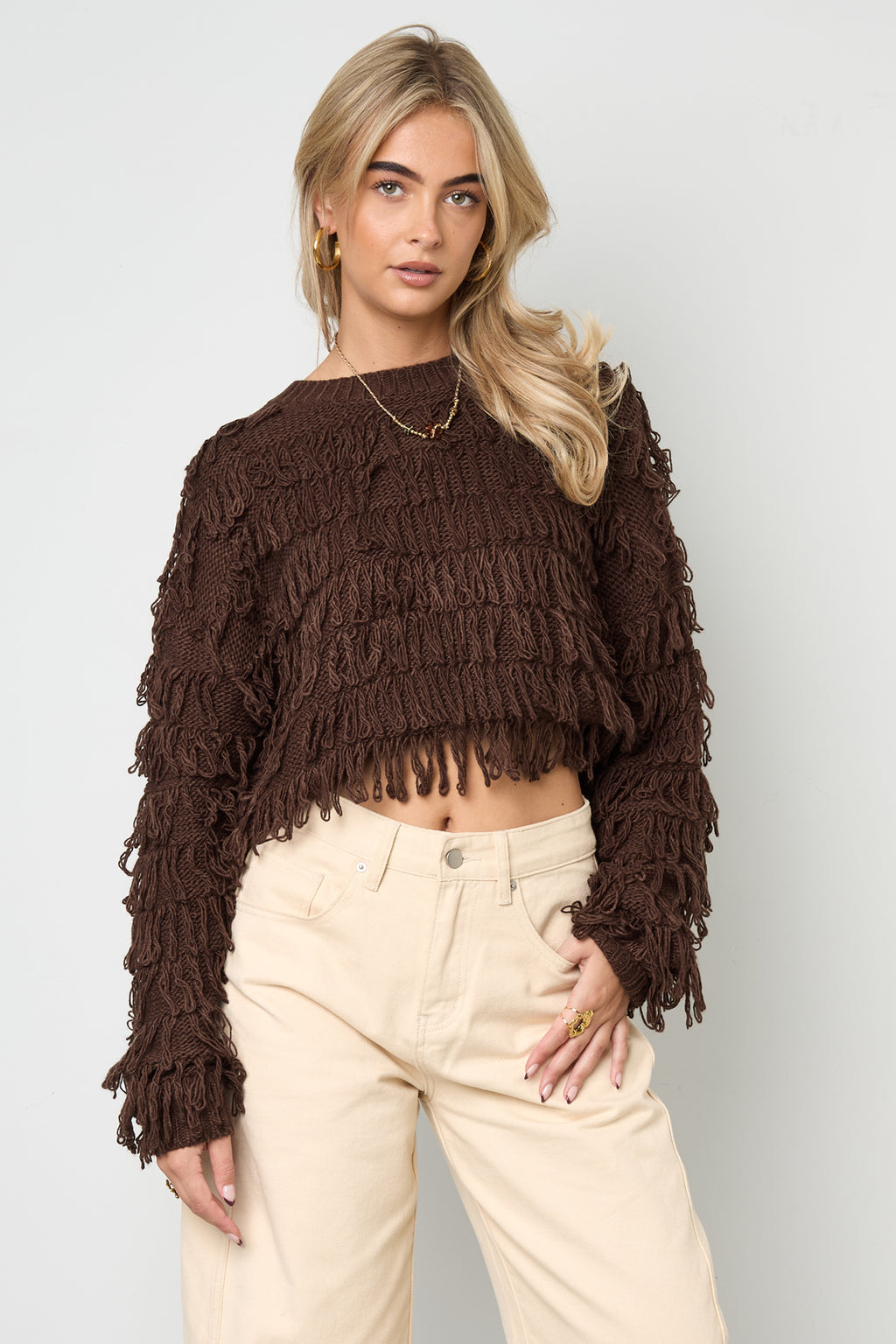 Knitted sweater with fringes