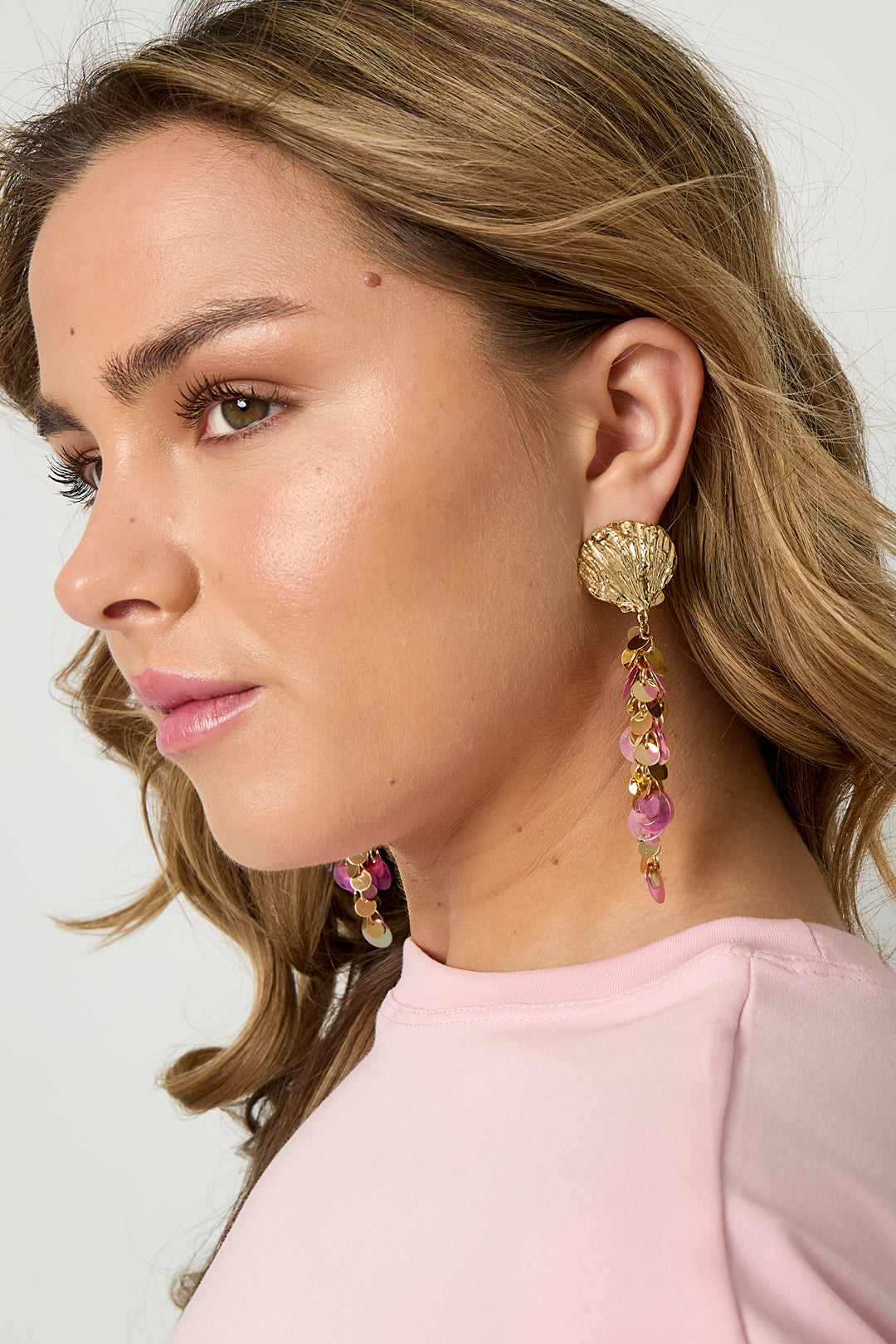 Shell earrings with hanging sequins