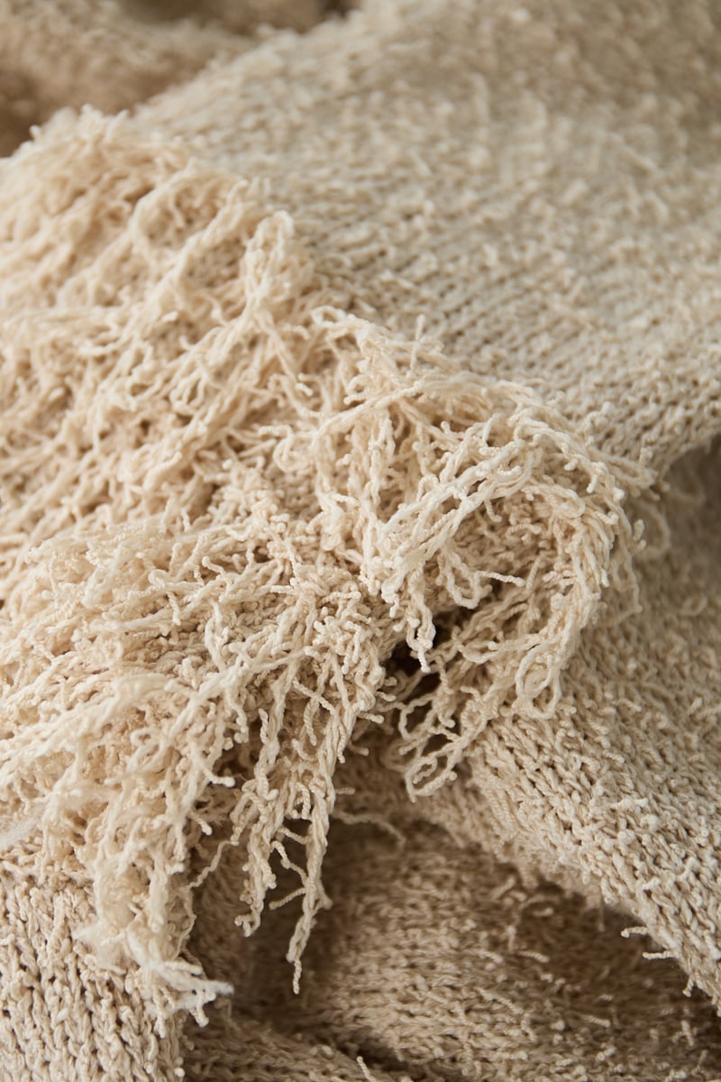 Cardigan with fringe sleeves