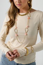 Long necklace with various beads and stones